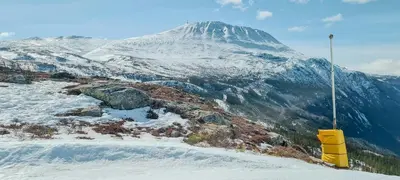 a snow covered mountain with a snow covered mountain at Luxury Mountain Home With View On Gaustablikk in Rjukan