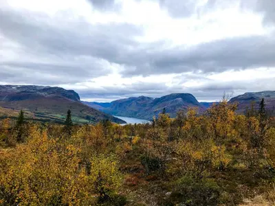 a view of a valley with a lake and mountains at Cozy Holiday Home Embraced By Valdres Hills in Vang I Valdres