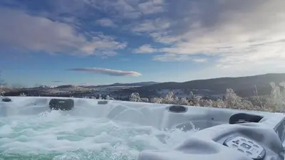 a bath tub covered in snow with a view at Simple Cabin Life In This Nature Cabin in Uvdal
