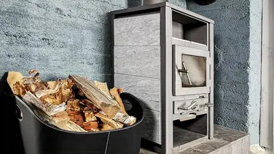 a trash can sitting next to a microwave at Simple Cabin Life In This Nature Cabin in Uvdal