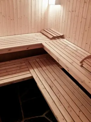 a sauna with a bench in a room at Large Cabin By Farhovdtjønn In Rauland in Rauland
