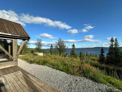 a cabin with a view of the water at Peaceful Cabin By Rødungen in Ål