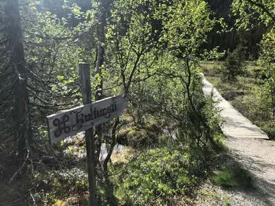 a sign on the side of a hiking trail at Mountain Home At Haglebu With Activities in Eggedal