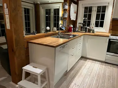 a kitchen with a sink and a counter top at Mountain Home At Haglebu With Activities in Eggedal