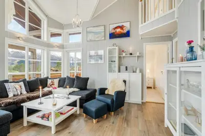 a living room with a couch and a table at High-Standard Cabin In Beautiful Rauland in Rauland