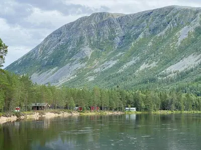 a view of a mountain with a body of water at Cabin With Great Fishing At Trysilfjellet in Jordet