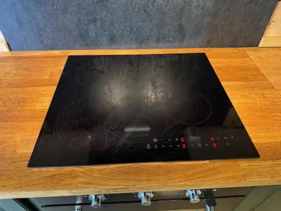 a tablet sitting on top of a wooden table at Lake view apartment in center of Bergen - 3 bedrooms in Bergen