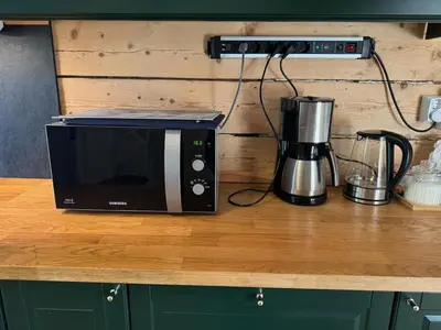 a microwave sitting on top of a counter at Lake view apartment in center of Bergen - 3 bedrooms in Bergen