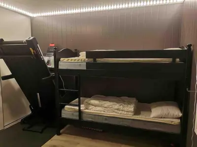 a couple of bunk beds in a room at Lovely apartment with stunning views in Torset