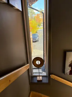 a room with a window with a wooden bowl on it at Modern & cozy house in Trondheim