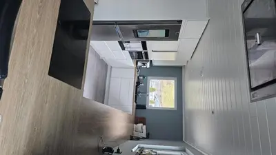 a small bathroom with a sink and a mirror at Casa Knott 4 Bedroom in Ulstein