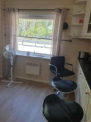 a room with two chairs and a window at Holiday Home Villa Gol in Gol