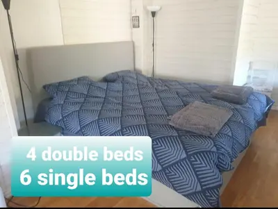 a bed with four double beds with the words single beds at Holiday Home Villa Gol in Gol