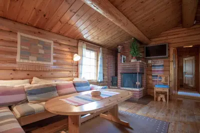 a living room with a couch and a table at Trysilfjellet Sør 204 in Trysil