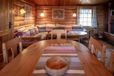 a dining room with a table and chairs at Trysilfjellet Sør 204 in Trysil