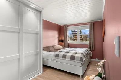 a small bedroom with a bed and a window at House with 5 bedrooms very close to World Cup 25 in Granåsen in Trondheim
