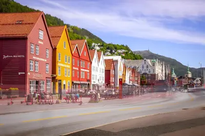 a city street with colorful buildings on a hill at Modern and chic city apartment - Bergen City in Bergen