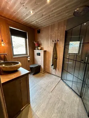 a bathroom with a sink and a shower at Norefjell! Newly built cabin with stunning view in Noresund