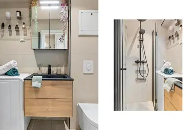 a bathroom with a sink and a shower at Lys og koselig leilighet in Trondheim