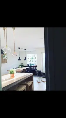 a kitchen with a counter top in a room at Townhouse in quiet and central area with free parking in Trondheim