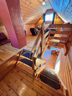 an overhead view of a loft bed in a cabin at TheHideaway in Sel