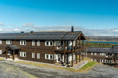 an aerial view of a building with a balcony at Stor leilighet på Bualie, Golsfjellet in Gol