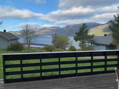 a view of a lake from a deck at Cabin 