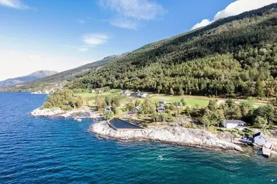 an aerial view of an island in the water at Cabin 