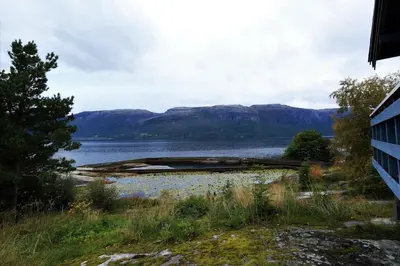 a view of a lake with mountains in the background at Cabin 