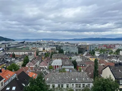 an aerial view of a city with buildings at Unique City Center 3-rooms panoramic view with free parking in Trondheim