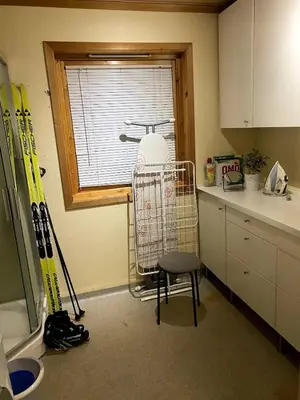 a kitchen with a cart in the corner of a kitchen at Large single-family home for rent World Cup 2025 in Trondheim