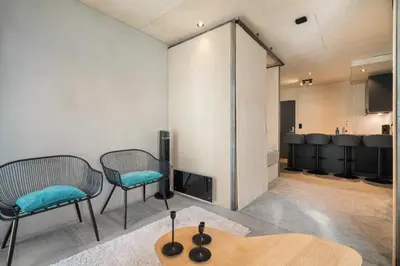 a meeting room with two chairs and a table at The Double Date I Architectural Gem in Bergen
