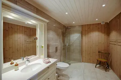 a bathroom with a sink and a toilet and a shower at Luxury And Comfort With Stunning Views in Beitostøl