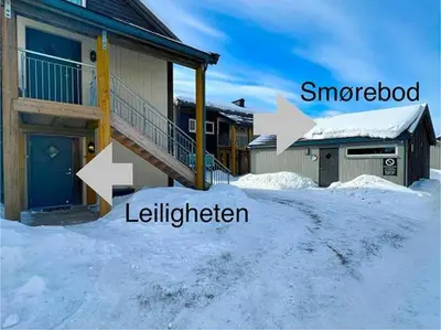 a picture of a house in the snow at Utsiktsleilighet med ski in out på Hafjell 7 sengeplasser in Hunder