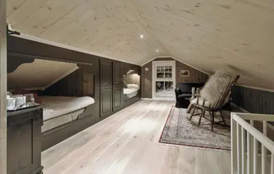 a room with two beds and a chair in a room at Amazing Home In Gålå With Sauna in Gålå