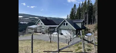 a house on top of a hill with at FrysiaHouse in Lillehammer