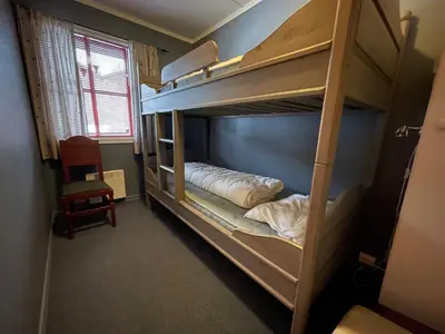 a room with two bunk beds in a room at Family-Friendly Stay Near Ski Trails! in Beitostøl