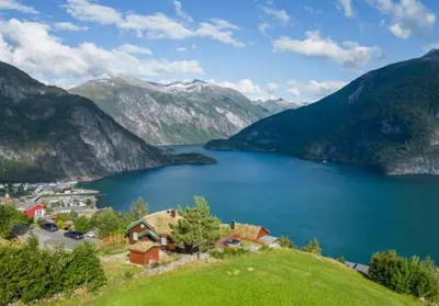 a view of a lake in the mountains at Panoramic Cabin With Fjord Views In Valldal in Valldal