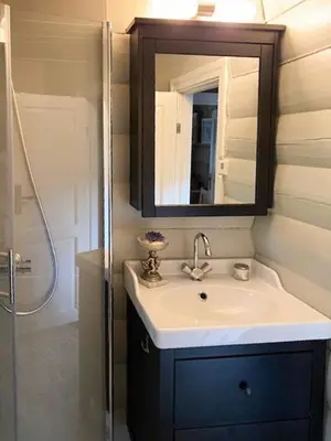 a bathroom with a sink and a mirror at Cabin In Rauland Near Fishing, Hiking And Skiing in Rauland
