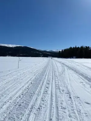 a snowy road with tire tracks in the snow at Cabin In Rauland Near Fishing, Hiking And Skiing in Rauland