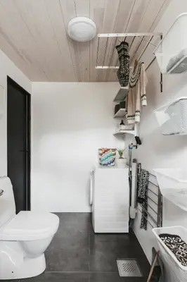 a bathroom with a toilet and a sink at Cabin By Selbusjøen With Ski And Trail Access in Selbu