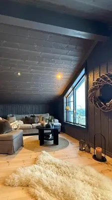 a living room with a couch and a table at Adventure And Relaxation In Voss in Vossevangen