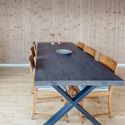 a wooden table with chairs and a plate on it at Unique Cabin By The Ski Slope In Hovden in Hovden
