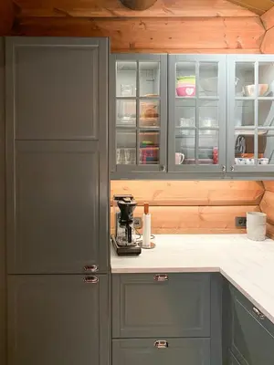 a kitchen with gray cabinets and a mixer on a counter at Timber Cabin With Fantastic View In Oppdal in Oppdal