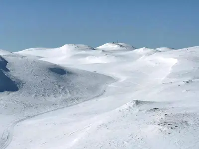 a snow covered mountain with a snow covered slope at Cabin With Panoramic View In Synnfjell in Nord Torpa