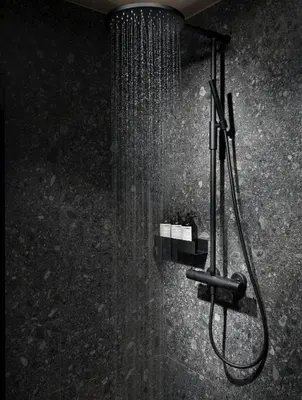 a shower with a shower head in a bathroom at Unique & Exclusive Mountain Cabin In Geilo in Geilo