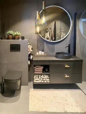 a bathroom with a sink and a toilet and a mirror at Mountain Home On Høgevarde With Majestic Views in Flå