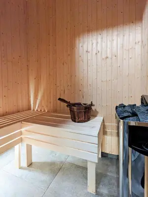 a wooden table with a basket on top of it at Spacious Familyabin With A View On Norefjell in Noresund