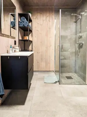 a bathroom with a shower and a sink at Spacious Familyabin With A View On Norefjell in Noresund