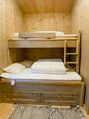 a bunk bed with two pillows on it at Stay At Norefjell, Ski-Inout And Panorama in Noresund